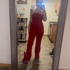 Red jump suit